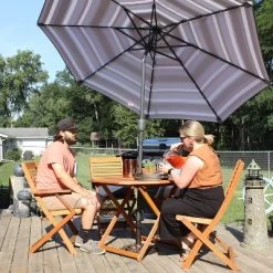 Sunnydaze Decor Sunnydaze Outdoor Meranti Wood With Teak Oil Finish Folding Patio Dining Table And Chairs - Brown - 5pc -Outdoor Comfort Deals Store GUEST 265be565 1c11 42c5 a038 49f1686bd25c