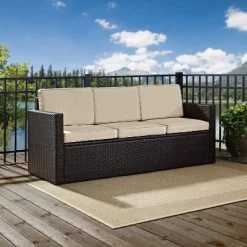 Palm Harbor Outdoor Wicker Sofa In Brown With Sand Cushions - Crosley -Outdoor Comfort Deals Store GUEST 88c4f0eb 67e9 45d8 965a 78f4e075bc83